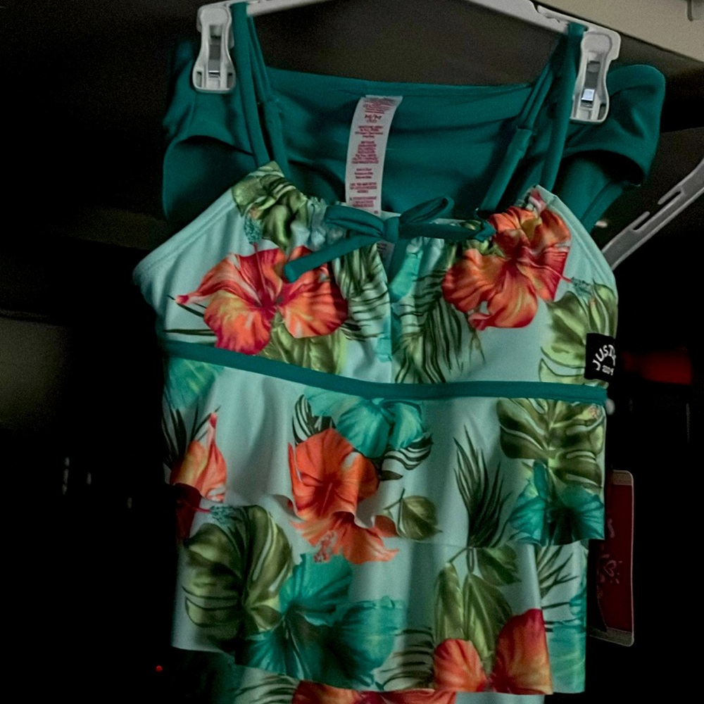 Young girls Justice two piece swimsuit in size medium Built in sun protection!